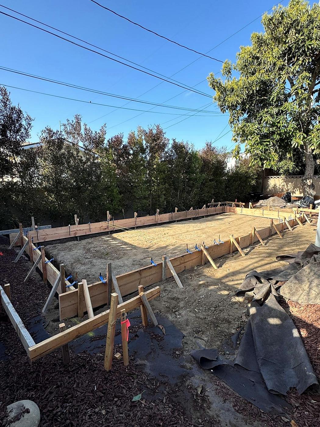 Wide view of the foundation forms before the pour