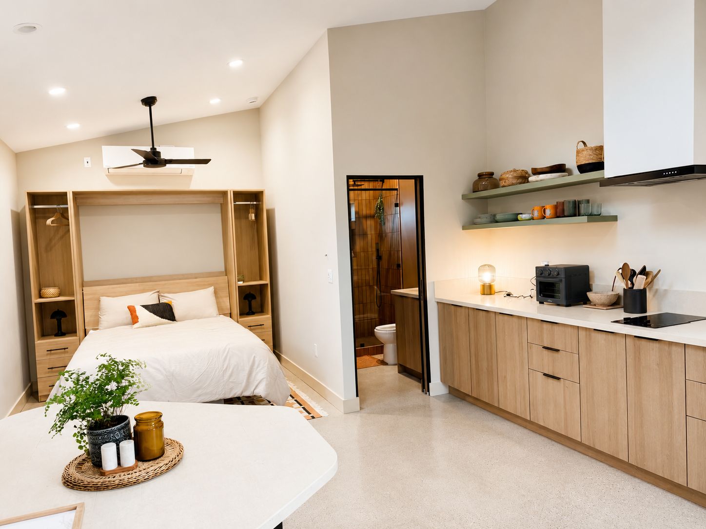 Bedroom area with built-in wood bed frame and storage