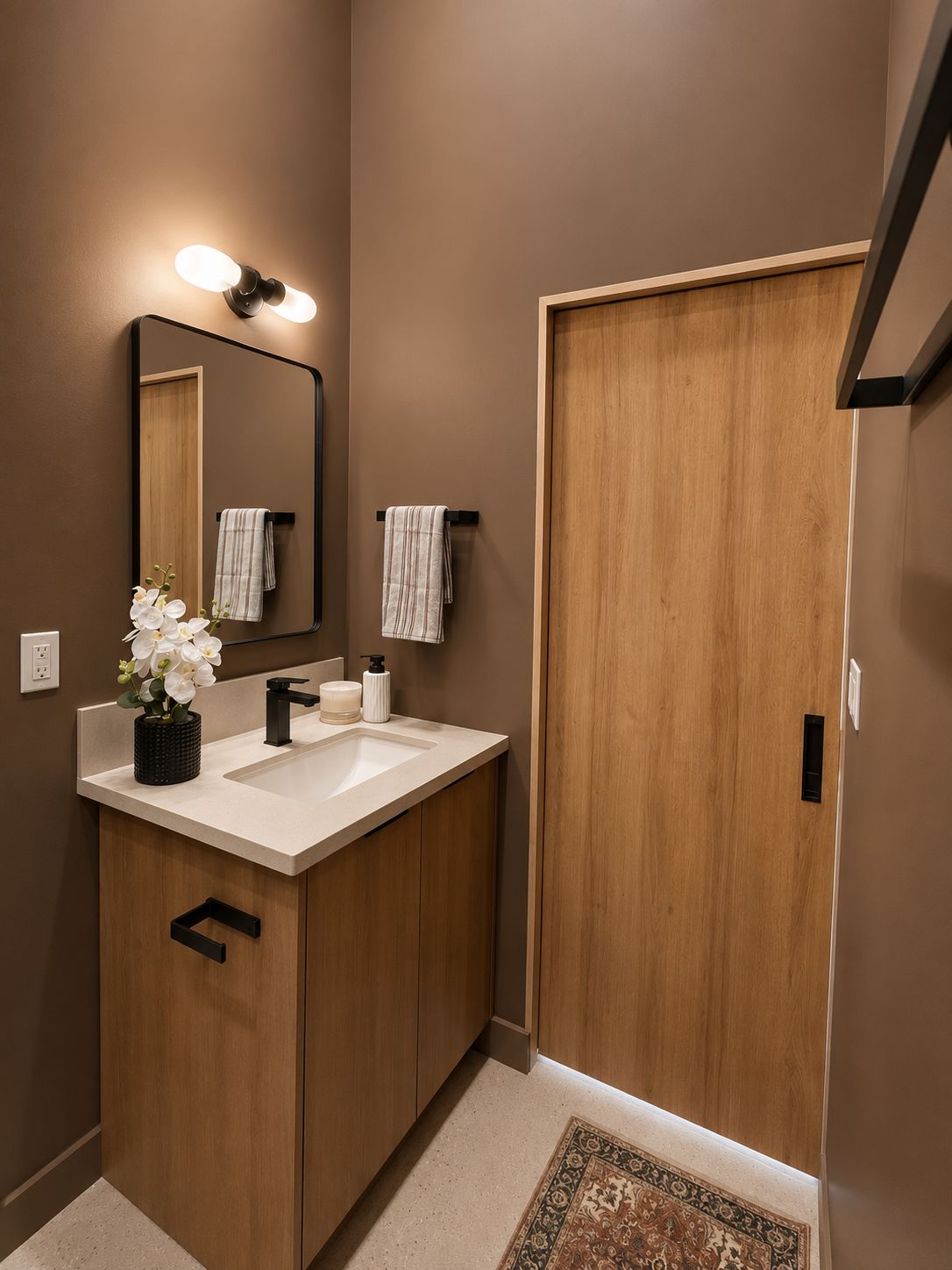 Bathroom vanity with mirror and sliding wood door