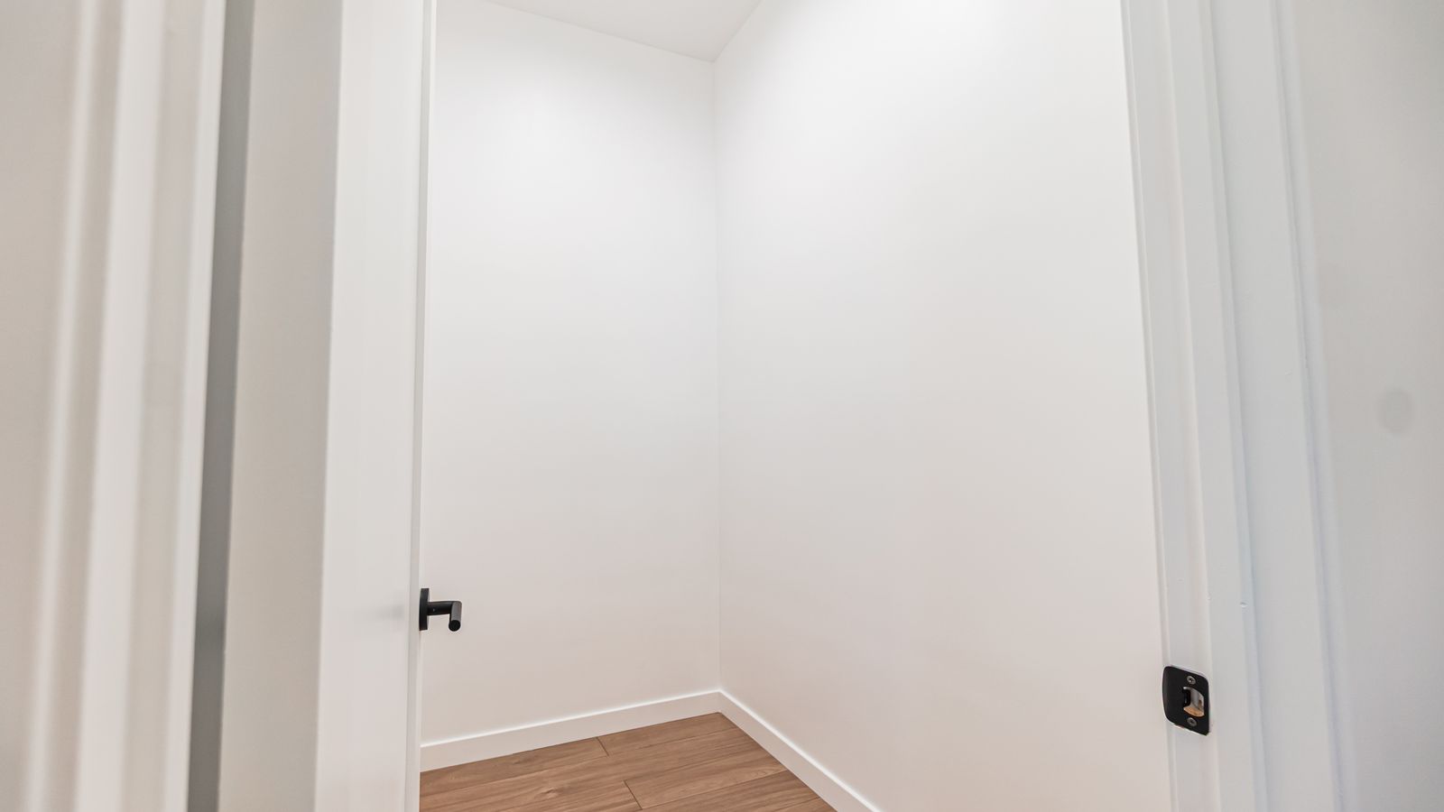 Closet nook with black hardware