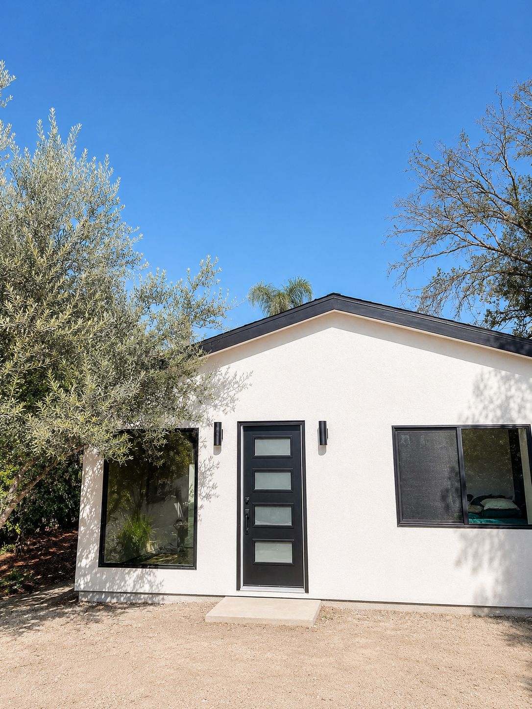 Finished ADU exterior with black front door