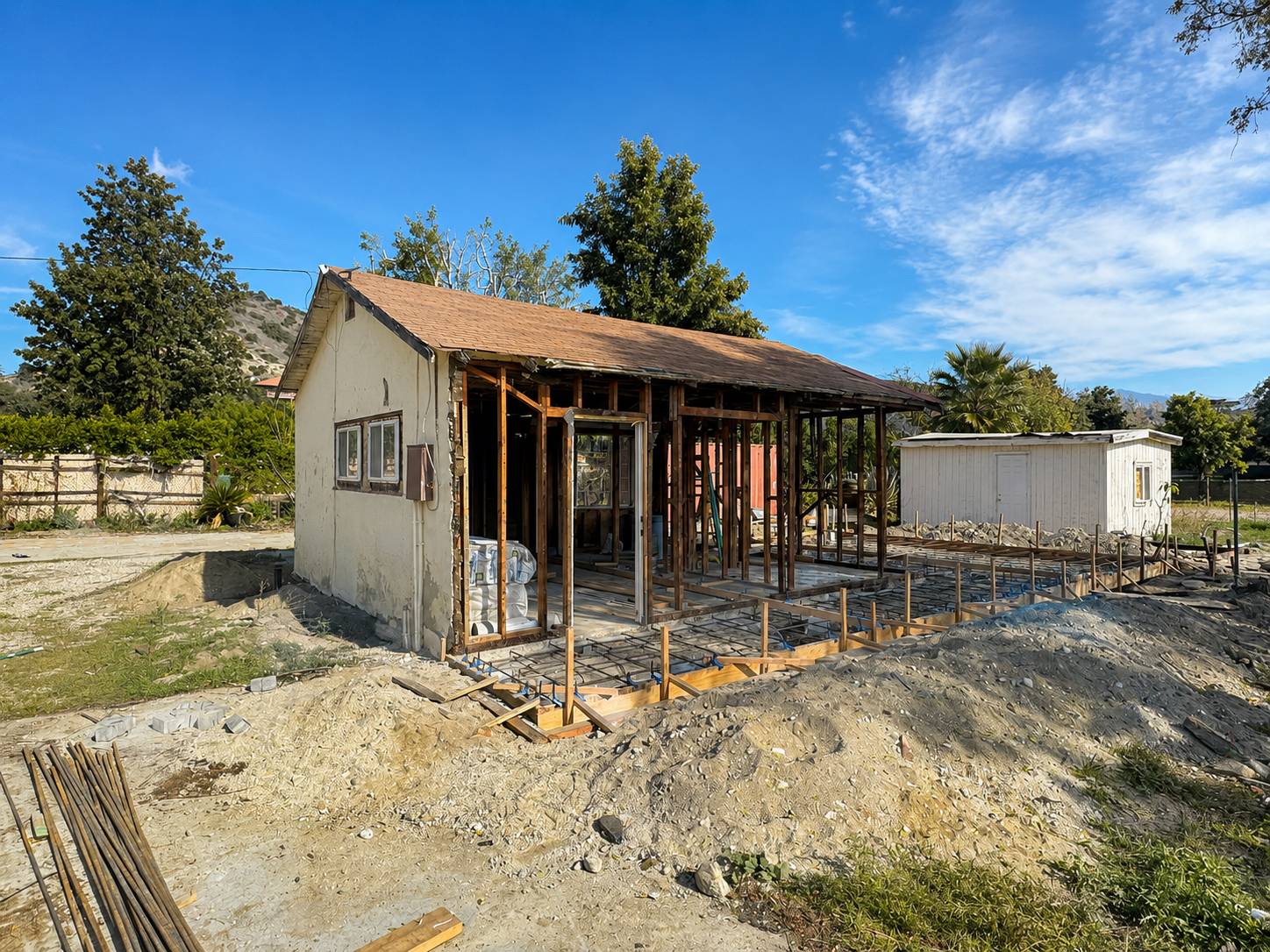 Construction in progress with new framing added to the original structure