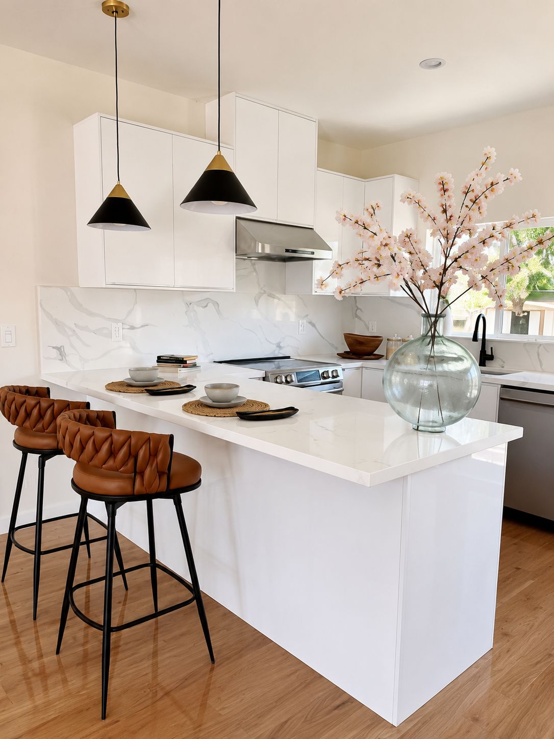 Kitchen island with pendant lighting and bar seating