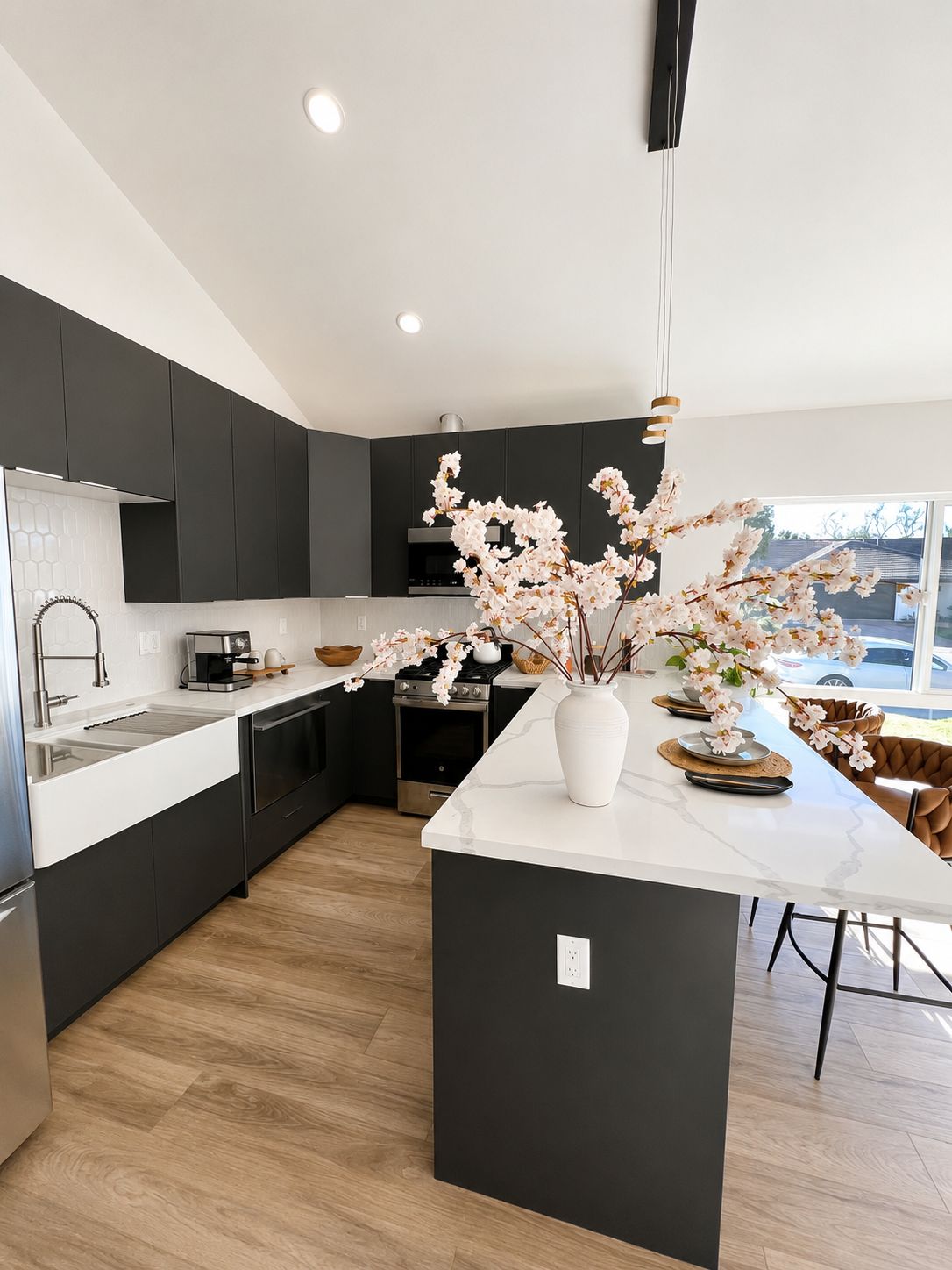Kitchen with farmhouse sink and dining area